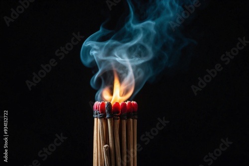 Flaming matches on a black background