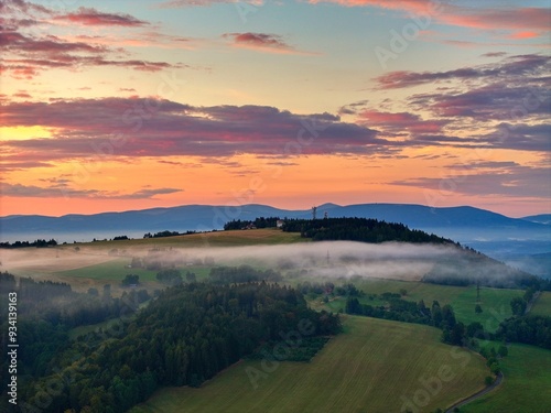 Misty Morning Landscape with Fog over Hills and Countryside in Czech Republic