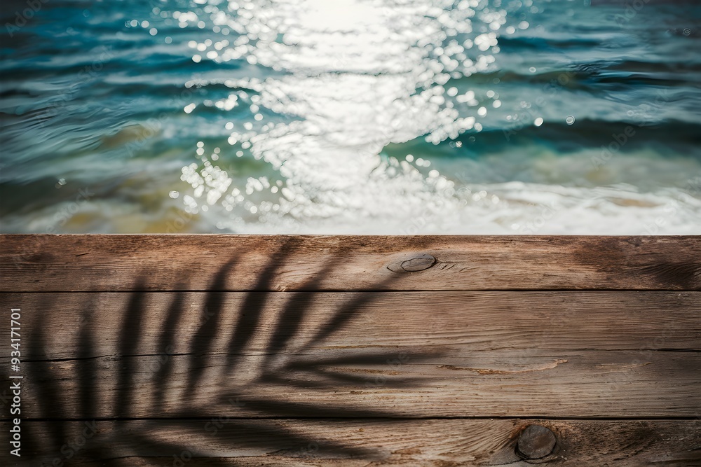 Serene seascape with palm leaf shadow on a rustic wooden surface Serene seascape with palm leaf shadow on a rustic wooden surface