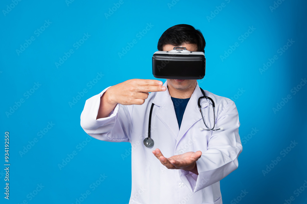 Smart doctor wearing VR headset connect metaverse touching screen with medicine research treatment futuristic tech hologram virtual reality intelligent meta world isolate blue background. Contrivance. Smart doctor wearing VR headset connect metaverse touching screen with medicine research treatment futuristic tech hologram virtual reality intelligent meta world isolate blue background. Contrivance.