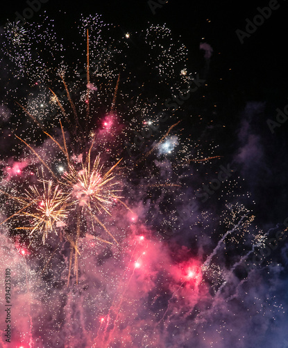 Colorful fireworks against night sky photo