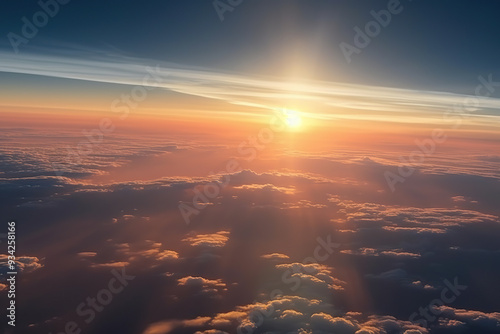 Sunrise above the clouds. View from the window.