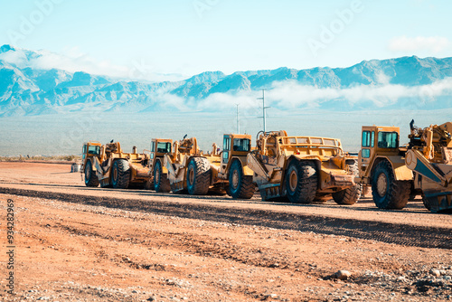 Heavy Machinery in Desert Mountain Landscape