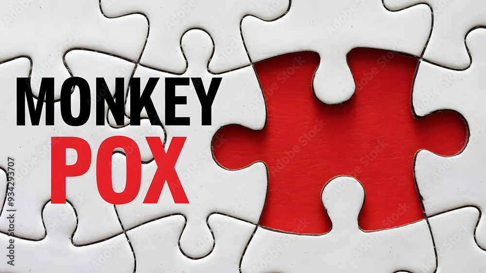 Fototapeta premium A white puzzle piece background features a prominent red puzzle piece with the text MONKEY POX in bold black letters.