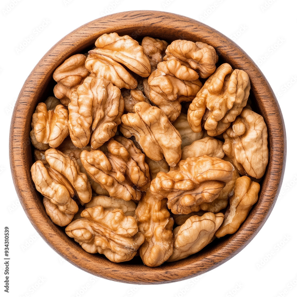 Heaped walnut kernels in rustic wooden bowl top view isolated on transparent background Heaped walnut kernels in rustic wooden bowl top view isolated on transparent background