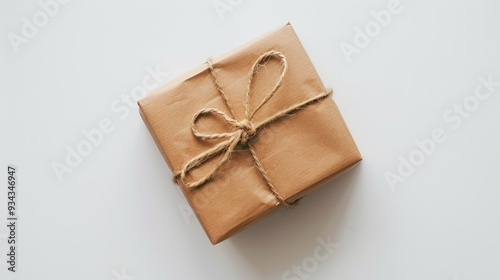 brown gift box on white surface photo