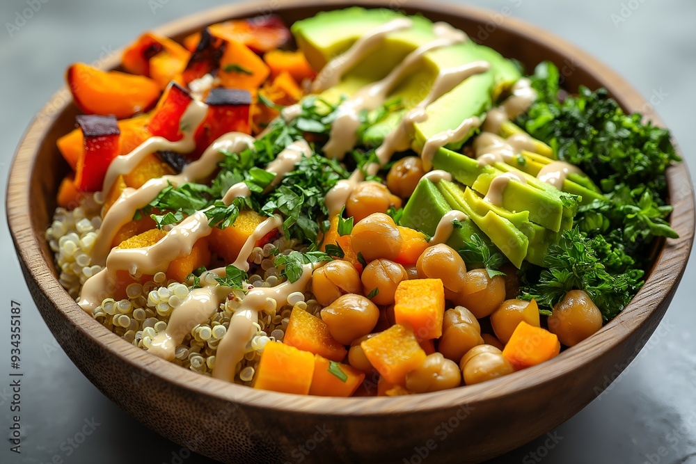 A Colorful Vegan Buddha Bowl Filled With Quinoa, Roasted Vegetables, Avocado, Chickpeas, And A Tahini Drizzle, Arranged In A Wooden Bowl, Food Photography, Food Menu Style Photo Image