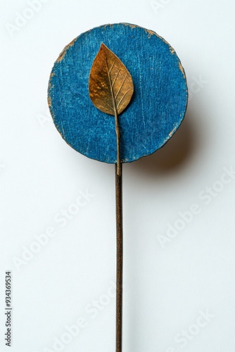 Arrow hitting blue and white target on weathered wooden surface