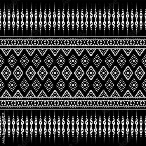 Abstract black and white seamless pattern. Geometric folklore embroidery ornament pattern on black background.