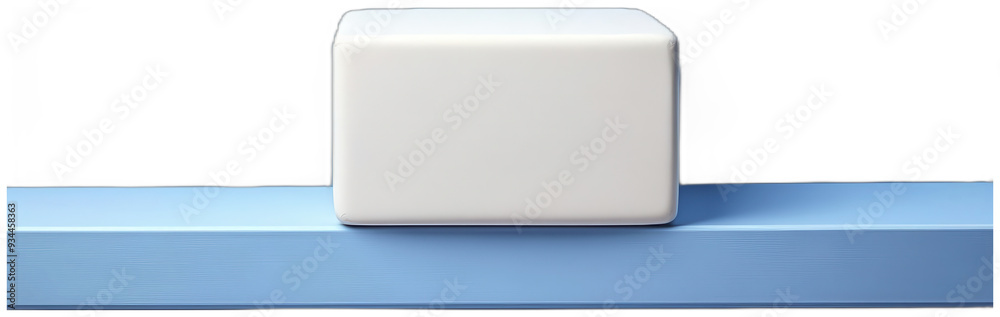 A white cube sits on a shelf against a simple background A white cube sits on a shelf against a simple background