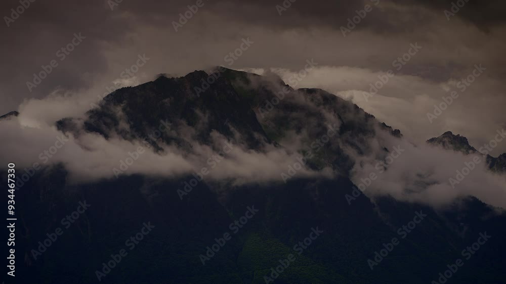Time Lapse of Cumulus Clouds moving over mountain landscape scenery Time Lapse of Cumulus Clouds moving over mountain landscape scenery