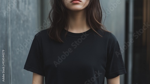 stylish outfit no face woman black t-shirt aesthetic architecture background