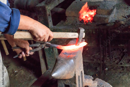 Europe, Romania. Viscri. Local Gypsy blacksmith. photo