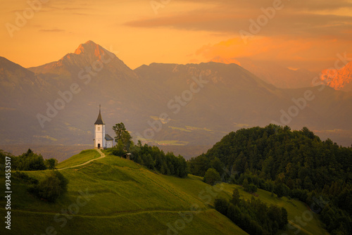 Europe, Slovenia. Chapel of St. Primoz at sunset.  photo