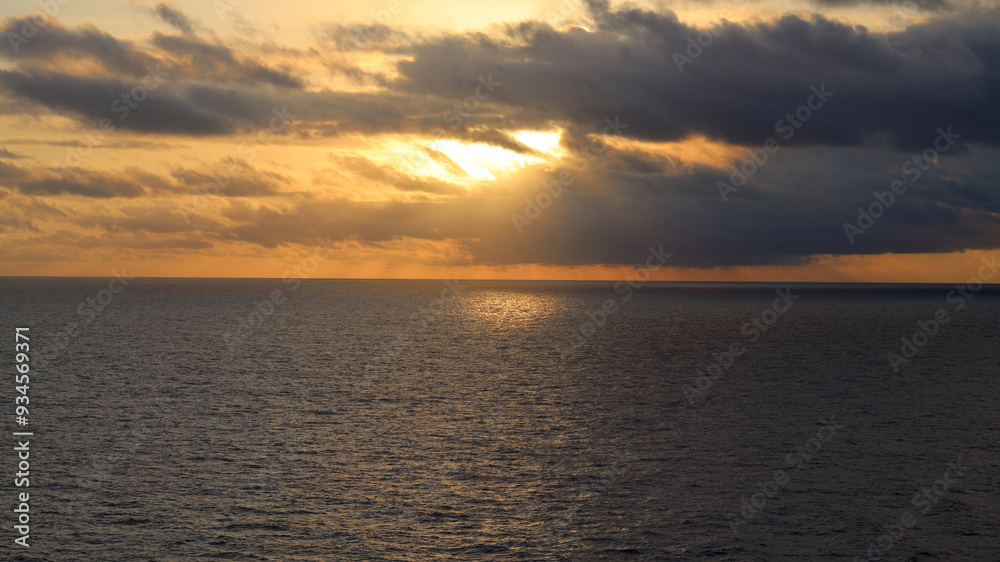Fototapeta premium Caribbean sunrise with dark morning clouds