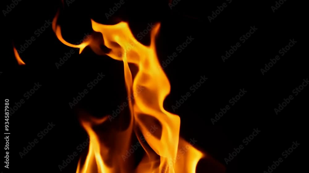Dramatic Flames Burning on Black Background in Slow Motion for Stunning Visual Effect Dramatic Flames Burning on Black Background in Slow Motion for Stunning Visual Effect