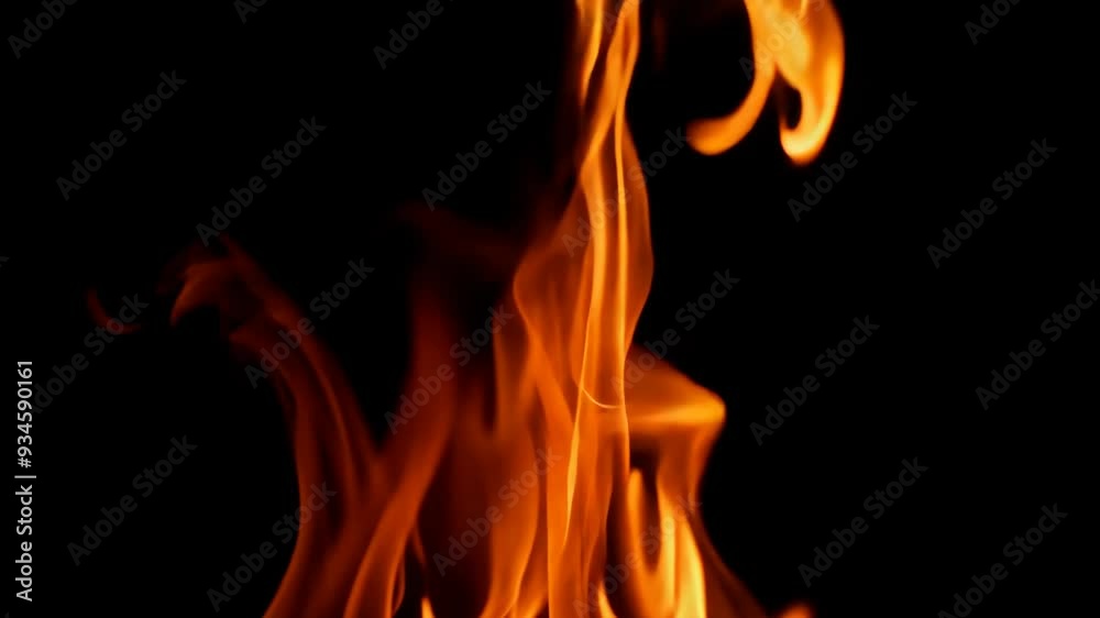 Intense Flames Burning in Slow Motion Against Black Background. Fire and flame effects Intense Flames Burning in Slow Motion Against Black Background. Fire and flame effects