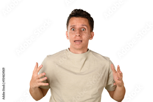 Obraz na plátne stupefied emotion of a white latino man in beige t-shirt on white background