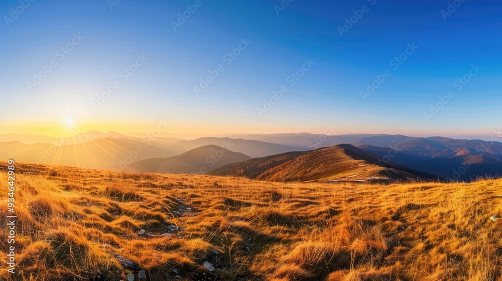 Fototapeta premium Golden Sunset Over Mountain Range