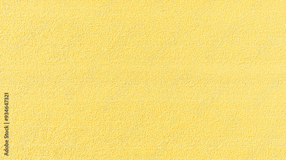 Fototapeta premium a seamless texture of slightly textured colored paper in pastel lemon color