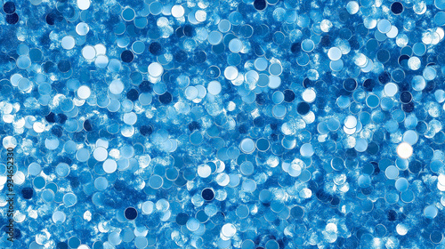 sparkling cerulean sequin texture with scattered sky blue and white accents photo