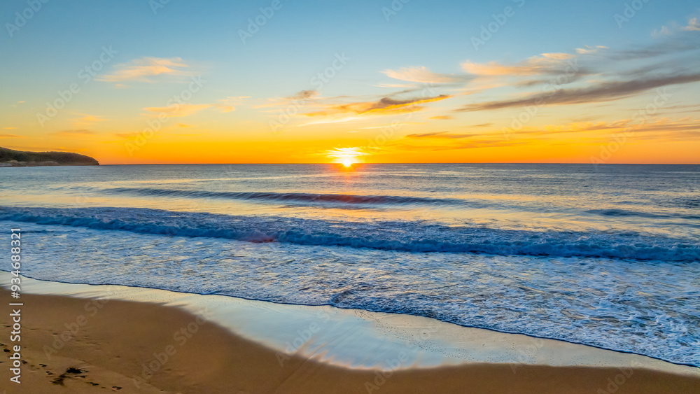 Sunrise at the seaside with high cloud Sunrise at the seaside with high cloud