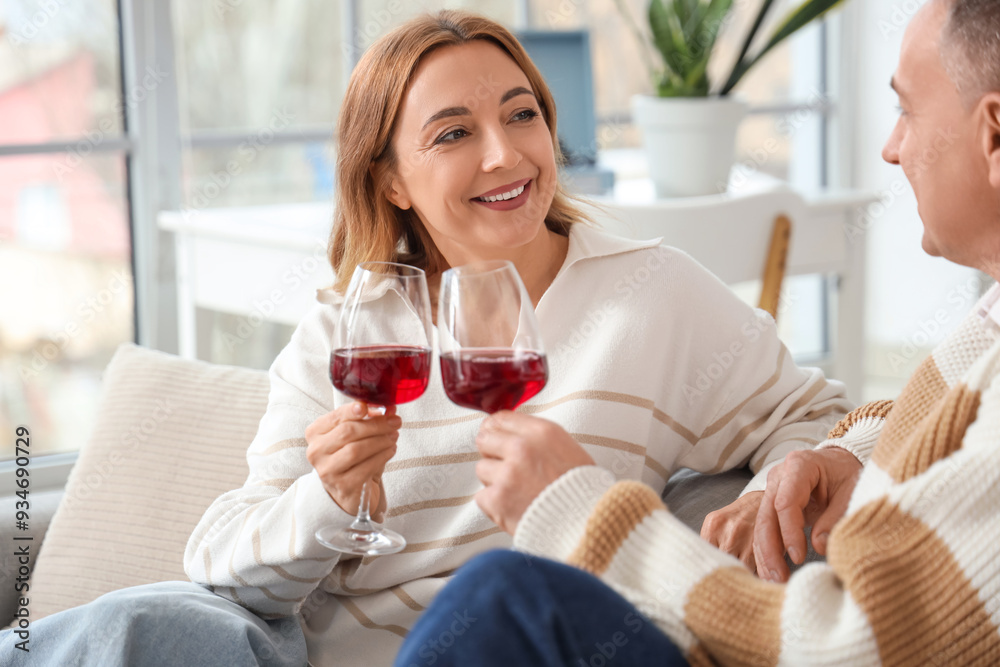 Mature couple with glasses of wine at home Mature couple with glasses of wine at home