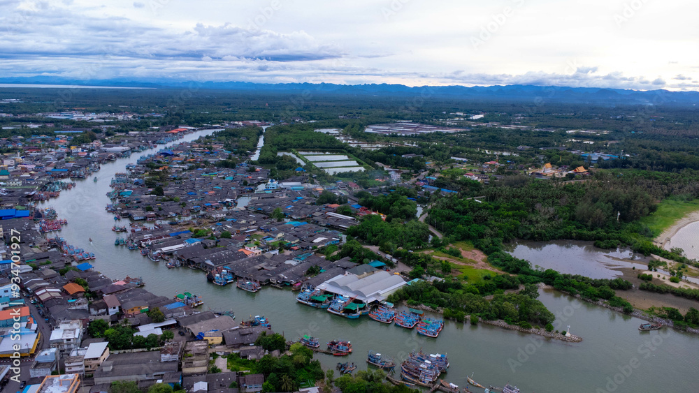 Fototapeta premium Aerial view of fishing village and gulf at Pak Nam Sichon, estuary area in Chumphon Province, Thailand.
