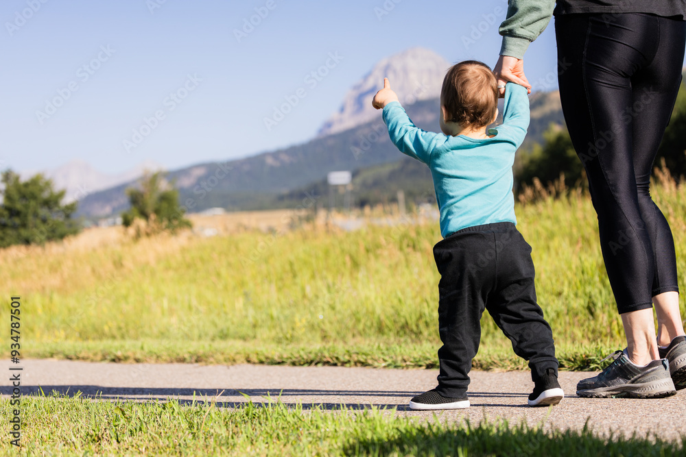 Mother And Child Walking In Crowsnest Pass, Alberta Mother And Child Walking In Crowsnest Pass, Alberta