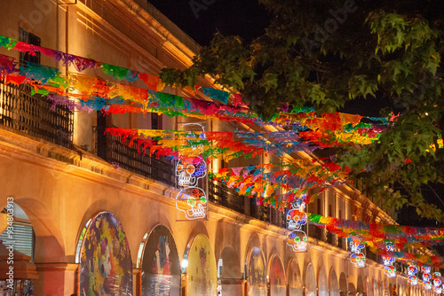 Nighttime Street with banners and Skull Lights for Day of the Dead