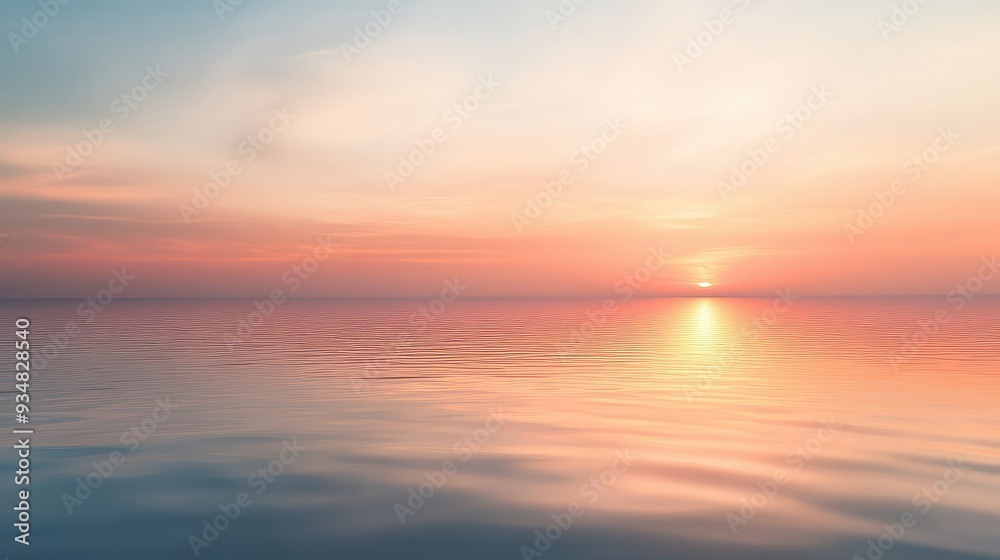 Obraz premium A pastel sunset over a calm sea, with the horizon blurring into a mirage-like effect of soft, warm colors.