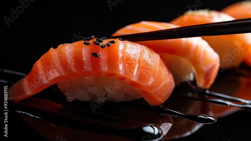 Sashimi sushi set close up with chopsticks