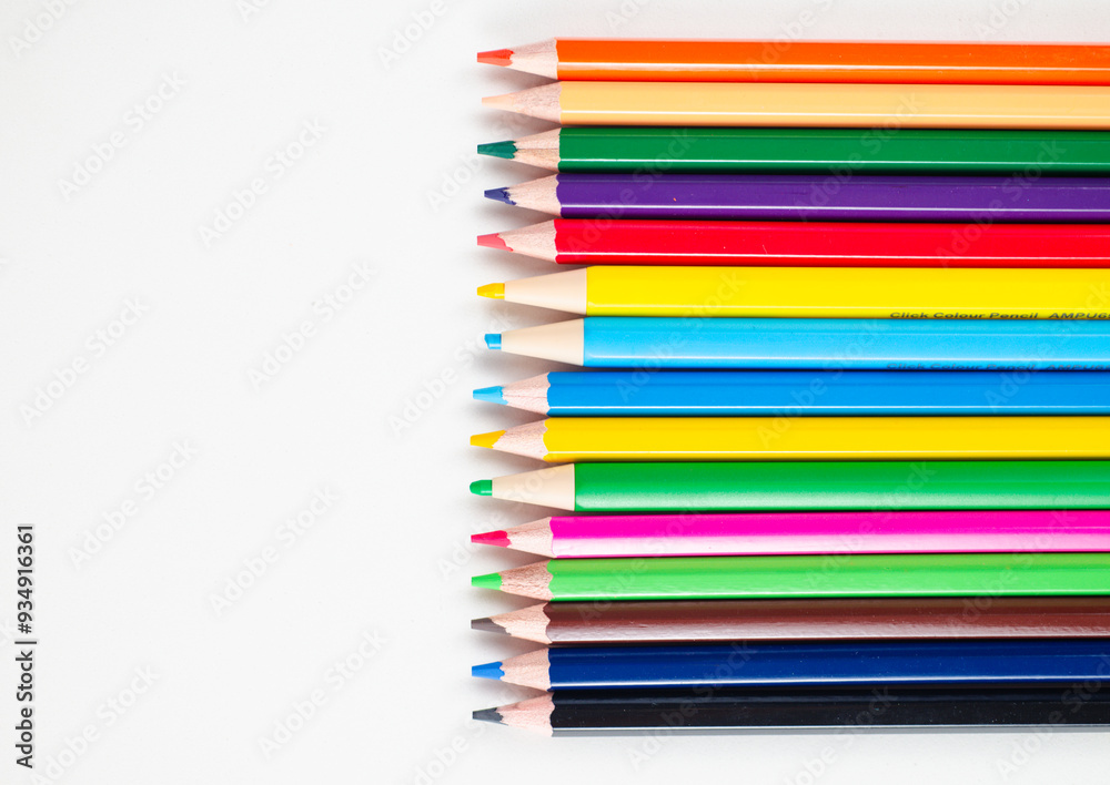 Pencil colors isolated on white background, variation of colour wooden pen design for abstract wallpaper. Colorful wood crayon collection for school education or kid drawing art creativity, close up. Pencil colors isolated on white background, variation of colour wooden pen design for abstract wallpaper. Colorful wood crayon collection for school education or kid drawing art creativity, close up.