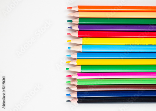 Pencil colors isolated on white background, variation of colour wooden pen design for abstract wallpaper. Colorful wood crayon collection for school education or kid drawing art creativity, close up.