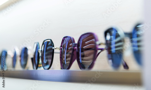 Many sunglasses displayed in the store