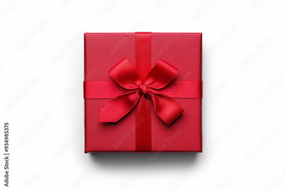 Red gift box with bow isolated on white background Red gift box with bow isolated on white background