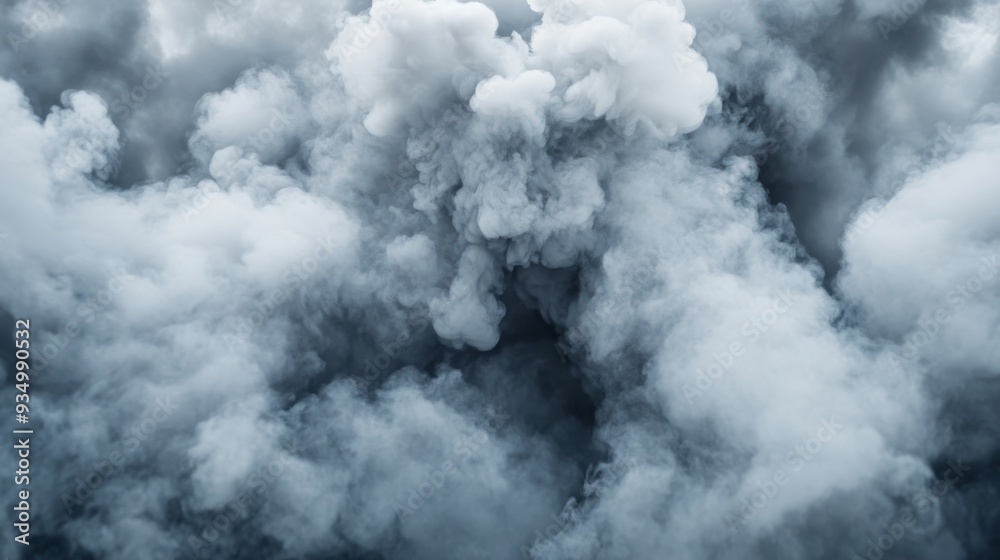 Close-up of thick, gray smoke pouring out from an industrial exhaust, with an emphasis on the dense, billowing texture Close-up of thick, gray smoke pouring out from an industrial exhaust, with an emphasis on the dense, billowing texture