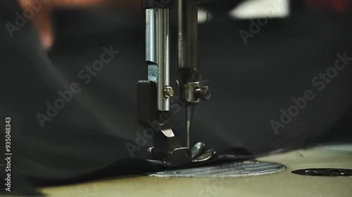 operation of a sewing machine in the activities of a tailor in sewing clothes