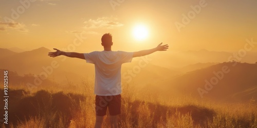 Man on Hill Enjoying Sunrise/Sunset with Outstretched Arms, Oran