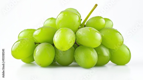 A bunch of fresh green grapes with water droplets, isolated on a white background.