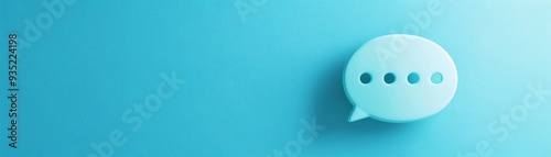 Minimalist light blue speech bubble on a blue background, representing communication or messaging. Ideal for social media or technology concepts.