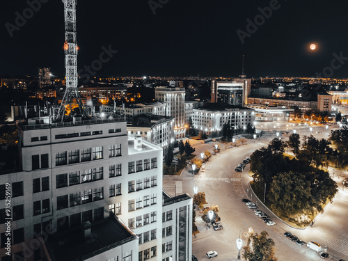 Aerial night view from Derzhprom building on Freedom Square in illuminated Kharkiv city, Ukraine photo