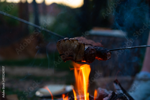 sausages on the grill photo