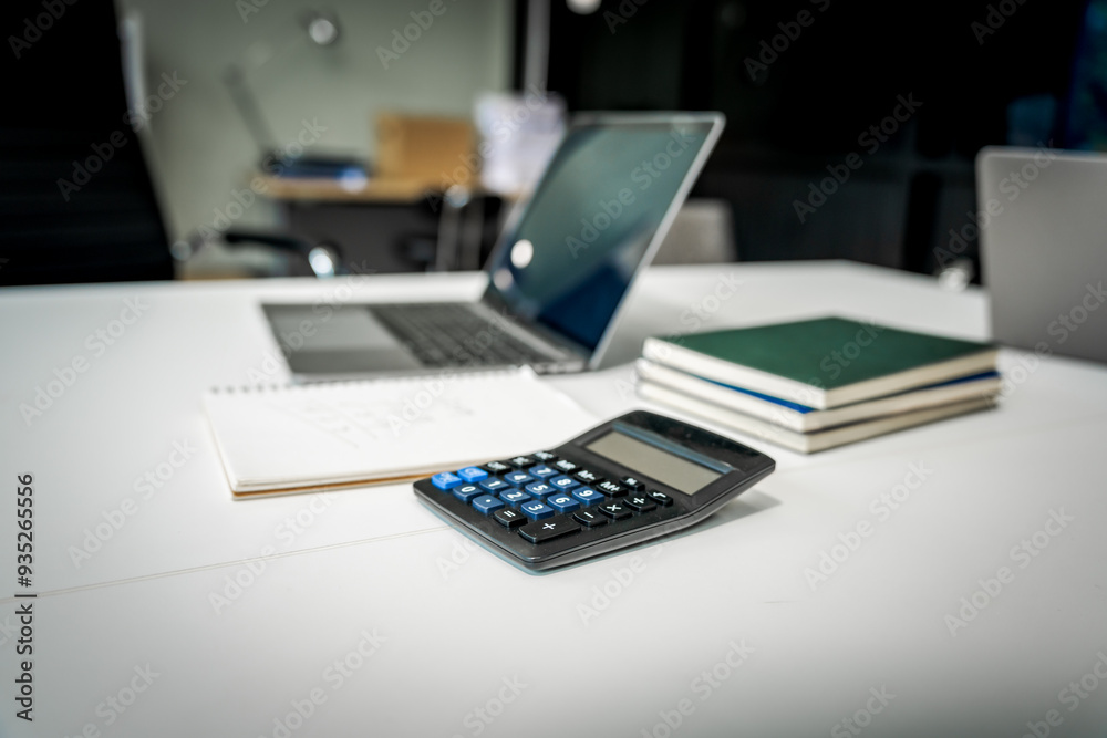 A modern office desk with a laptop, monitor, and plant. sleek, minimal design features open space, technology and productivity. room is empty, offering a clean and organized workspace. A modern office desk with a laptop, monitor, and plant. sleek, minimal design features open space, technology and productivity. room is empty, offering a clean and organized workspace.