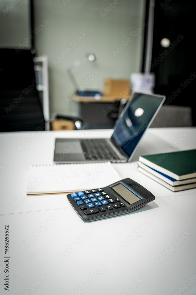 A modern office desk with a laptop, monitor, and plant. sleek, minimal design features open space, technology and productivity. room is empty, offering a clean and organized workspace. A modern office desk with a laptop, monitor, and plant. sleek, minimal design features open space, technology and productivity. room is empty, offering a clean and organized workspace.