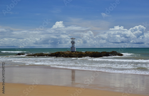 The lighthouse is next to the shore. Khao Lak. Thailand.