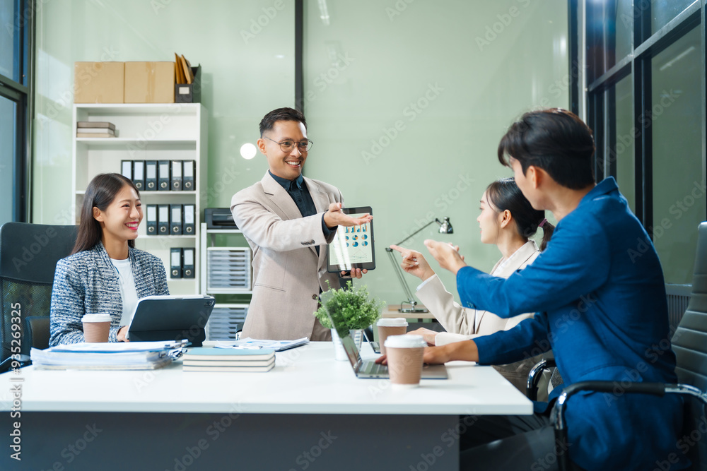 In a boardroom, an Asian team meets at a desk, presenting financial terms and strategies. Executives and employees collaborate, sharing ideas and work guidelines for success during an annual meeting. In a boardroom, an Asian team meets at a desk, presenting financial terms and strategies. Executives and employees collaborate, sharing ideas and work guidelines for success during an annual meeting.