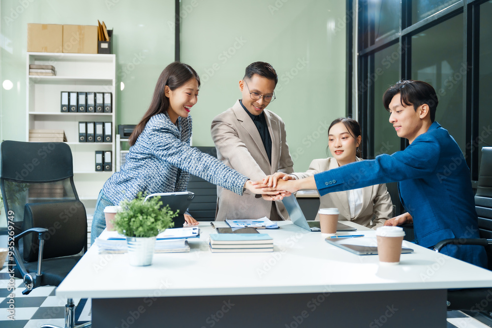 In a boardroom, an Asian team meets at a desk, presenting financial terms and strategies. Executives and employees collaborate, sharing ideas and work guidelines for success during an annual meeting. In a boardroom, an Asian team meets at a desk, presenting financial terms and strategies. Executives and employees collaborate, sharing ideas and work guidelines for success during an annual meeting.