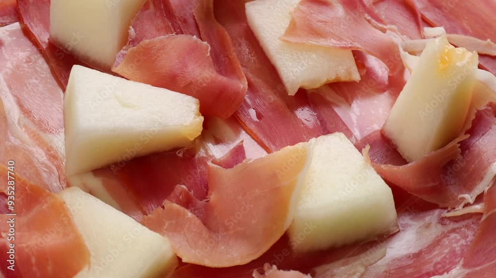 Honeydew melon with hamon. pieces of yellow melon, rotation in circle. melon with dread meat, Turning. Honeydew melon with hamon. pieces of yellow melon, rotation in circle. melon with dread meat, Turning.