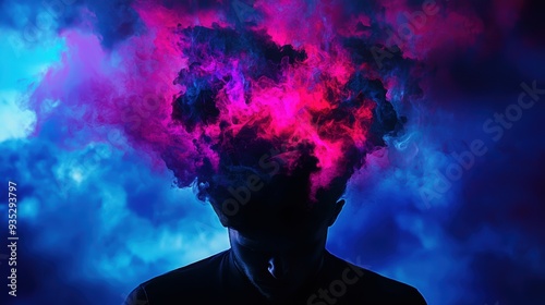 Man's Enigmatic Silhouette with Vivid Cloud of Colors Against a Stormy Sky